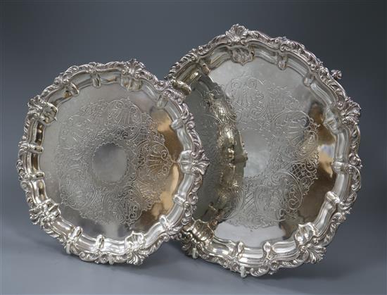 A set of two graduated engraved silver salvers, Roberts & Belk, Sheffield, 1972, 49.5 oz.